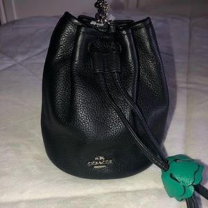 Coach pebbled leather priestly wristlet.